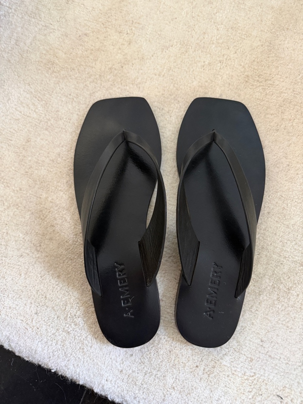 A. Emery Black Kinto Sandals